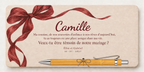 Plaque printed in colour with a burgundy bow, the name Camille and a bamboo pen