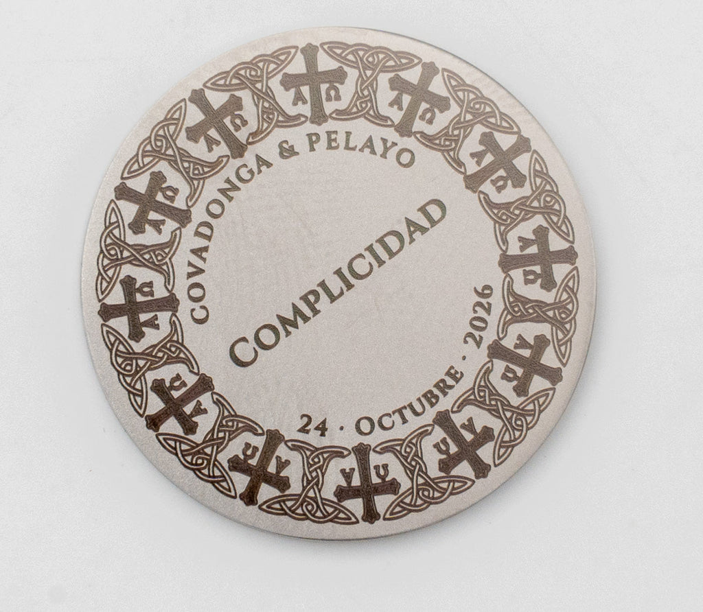 Wedding coin with a design of Asturian crosses and Celtic knots around the edge.