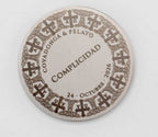 Wedding coin with a design of Asturian crosses and Celtic knots around the edge.