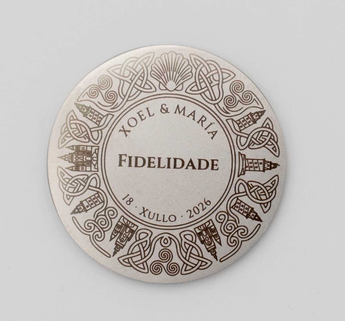 Galician wedding coins with the Tower of Hercules, scallop shells and traditional Celtic knots.