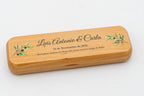 Closed case with a wedding dedication and coloured branch decoration.