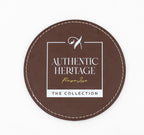Round brown coaster with a white Authentic Heritage logo.