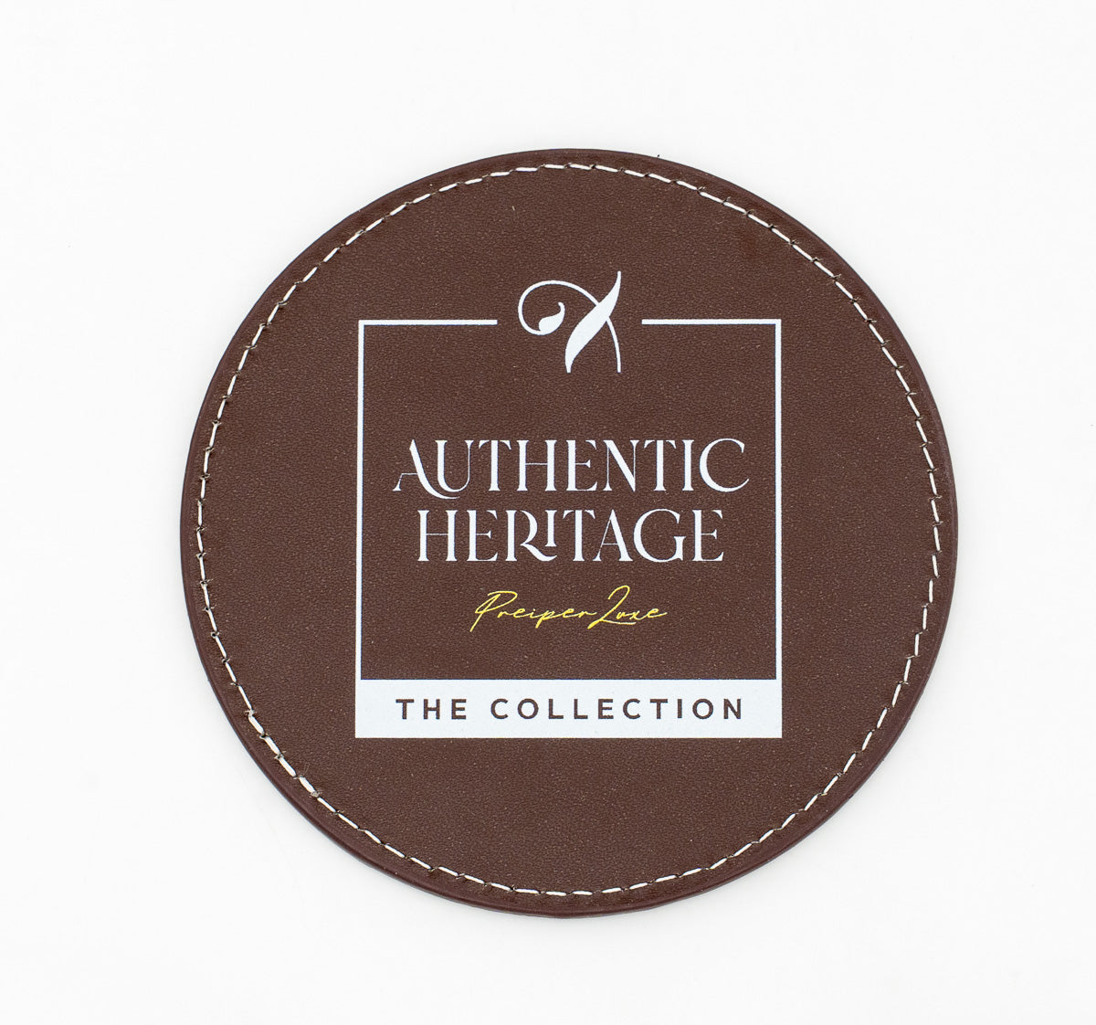 Round brown coaster with a white Authentic Heritage logo.