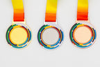 Medals with segmented multicoloured rings around the centre, model 1.