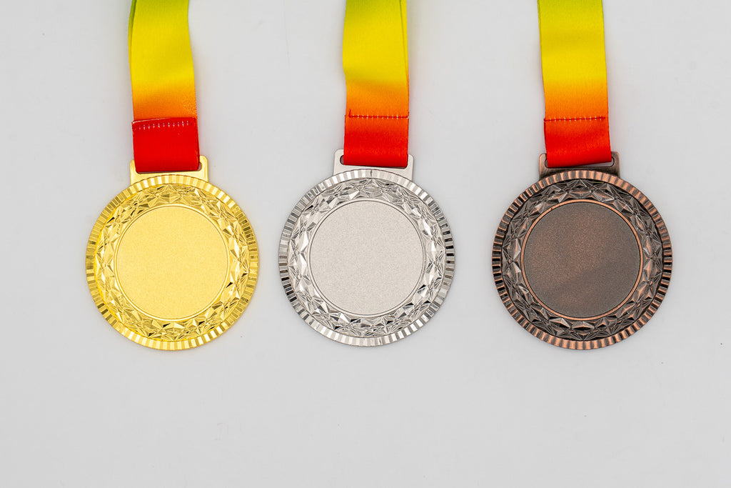 Medals with a faceted border and flat centre, model 2.
