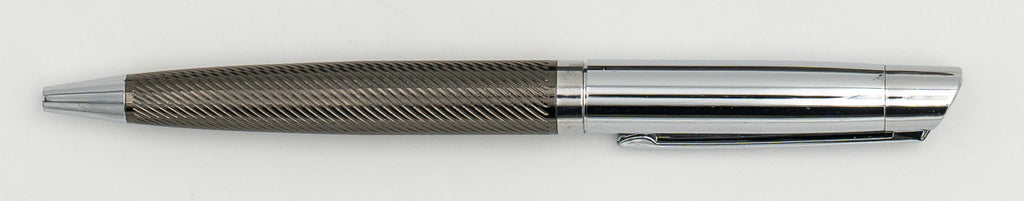 Silver metal pen with a shiny upper section and a clip.