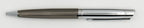 Silver metal pen with a shiny upper section and a clip.