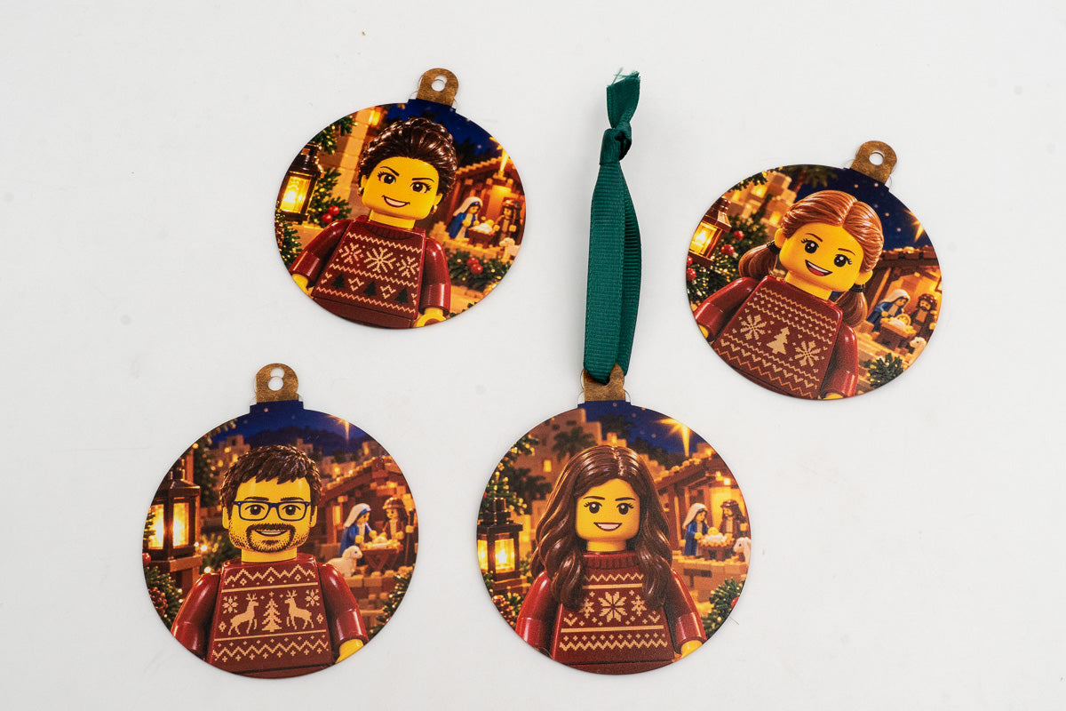 Four flat ornaments with toy-block-style characters and Nativity scenes.