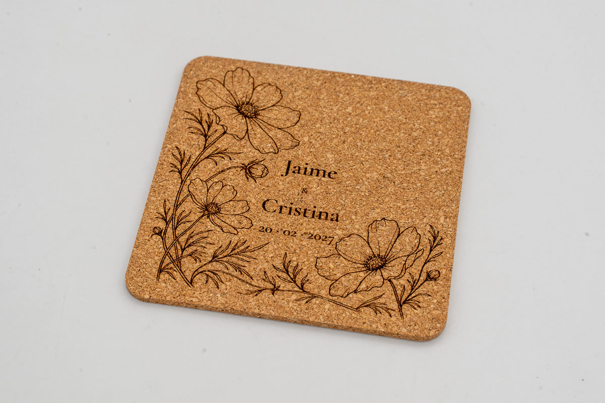 Square cork coaster with engraved flowers, Jaime and Cristina.