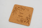 Square cork coaster with engraved branches, Tere and Tono.