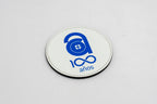 Round white coaster with a blue centenary logo.