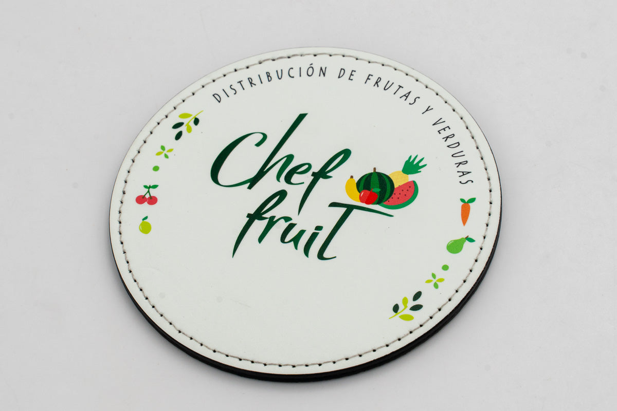 Round white coaster with Chef Fruit branding and colour fruit illustrations.