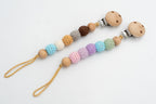 Dummy clips with crochet-covered beads in pastel and earth-tone combinations