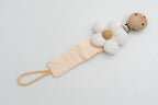 Fabric dummy clip with a white flower with a camel centre and a wooden clip