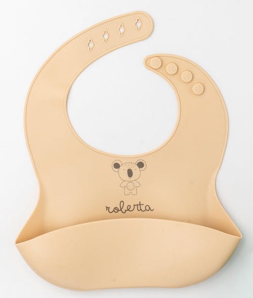 Light peach silicone bib with the name Roberta and a koala engraved