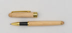 Pale wooden pen with its cap removed, a gold-coloured clip and a black grip.