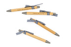 Engraved bamboo pens used to invite wedding witnesses, with blue checked bows.