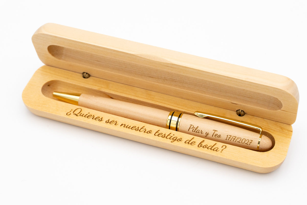 Presentation example of a pale wooden pen with gold-coloured details in an open case engraved for a wedding witness.