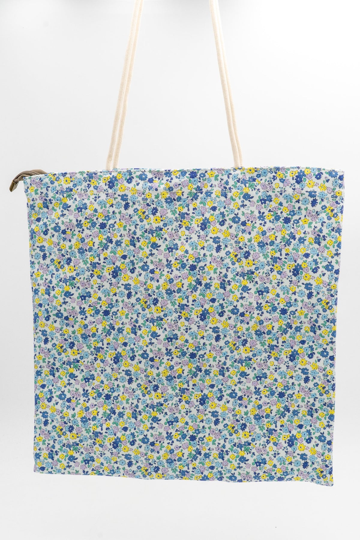 Cotton bag with blue and white floral print and long rope handles