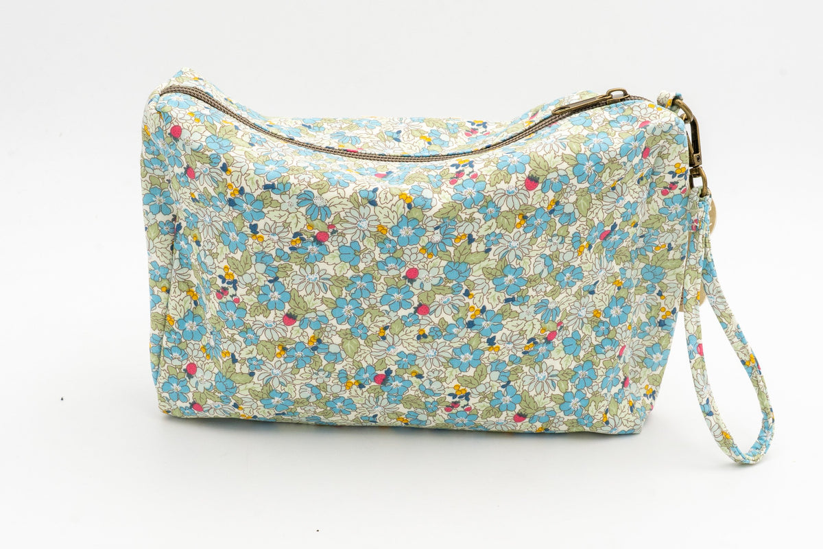 Green floral toiletry bag with matching side handle and metal top zip