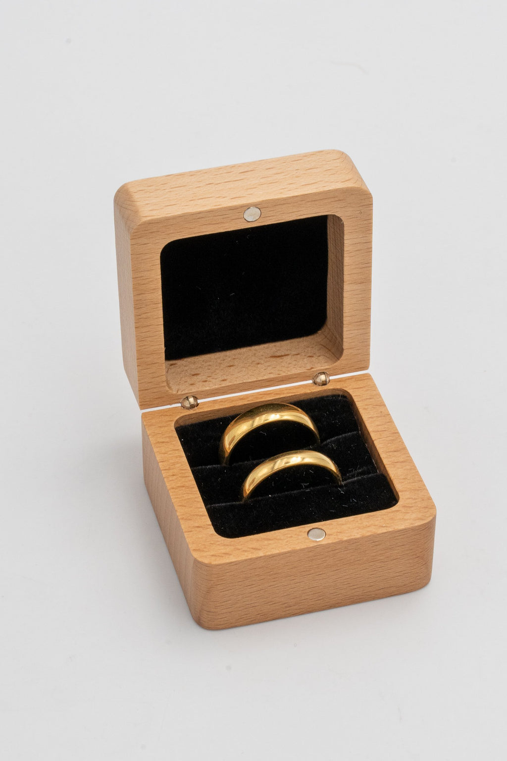 Open square ring box with a black interior