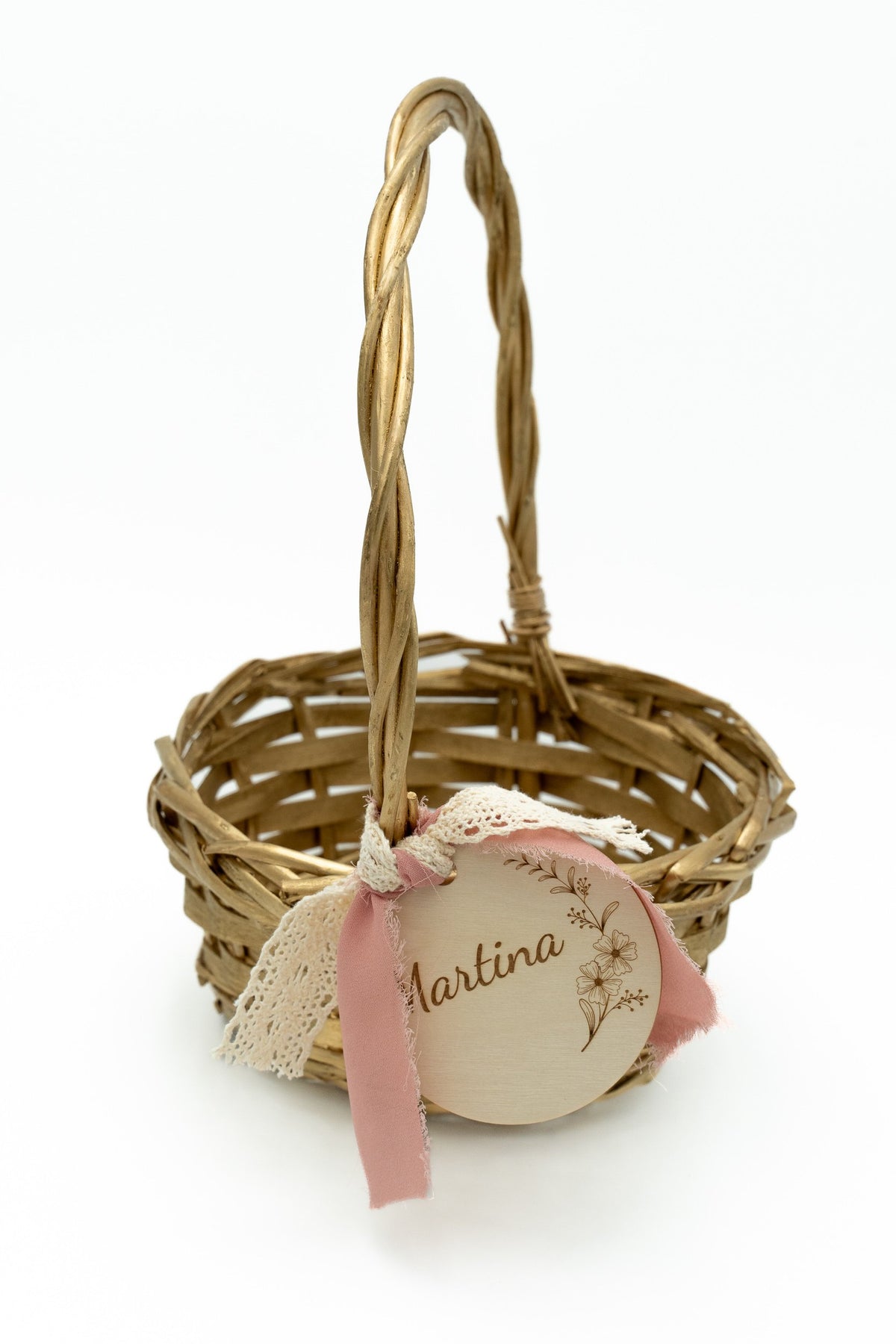 Gold basket with a tall handle, pink bow and the name Martina