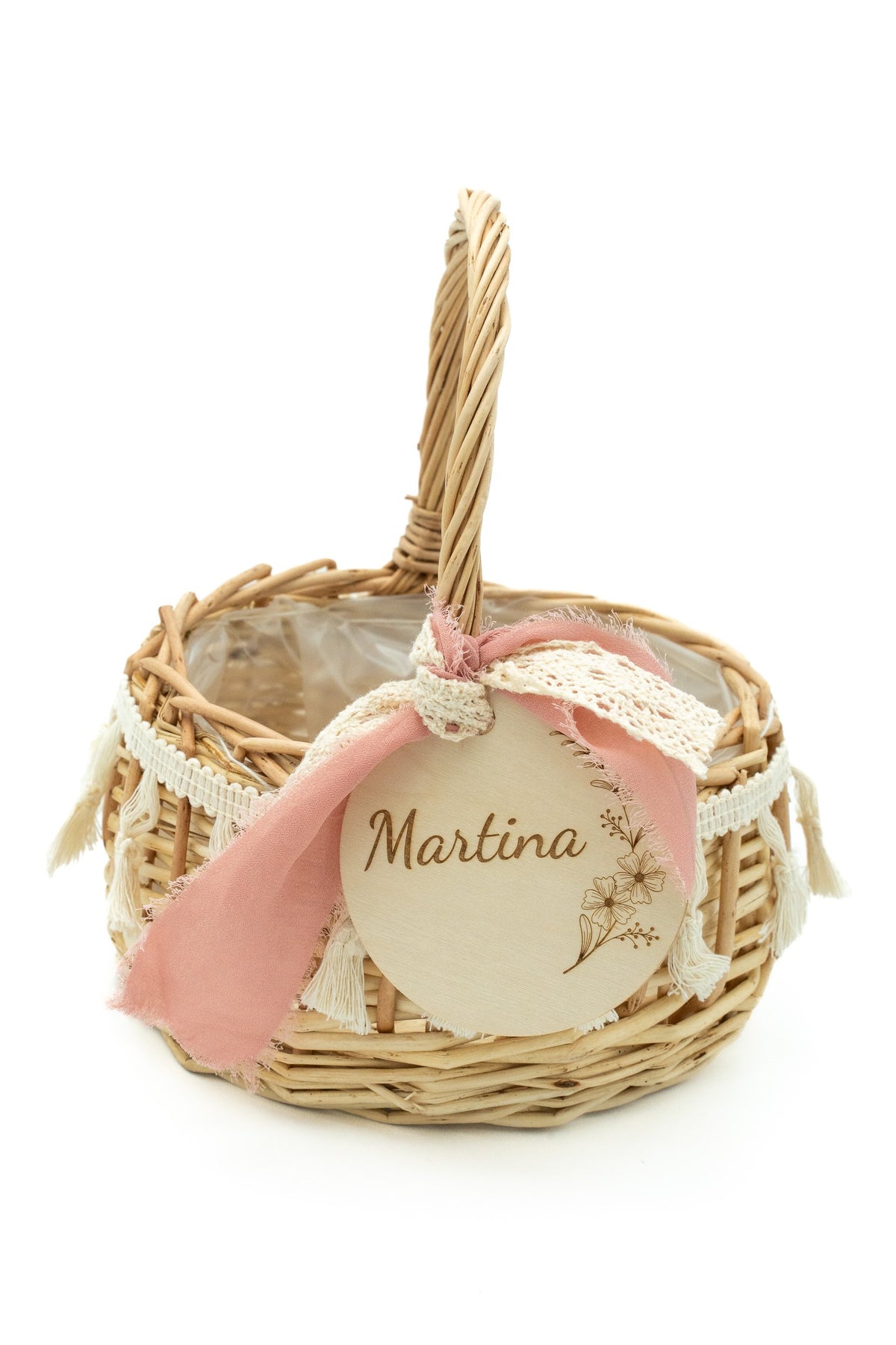 Rattan basket with a pink bow and lace and the name Martina