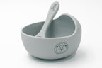 Grey bowl with a lion and spoon with a name