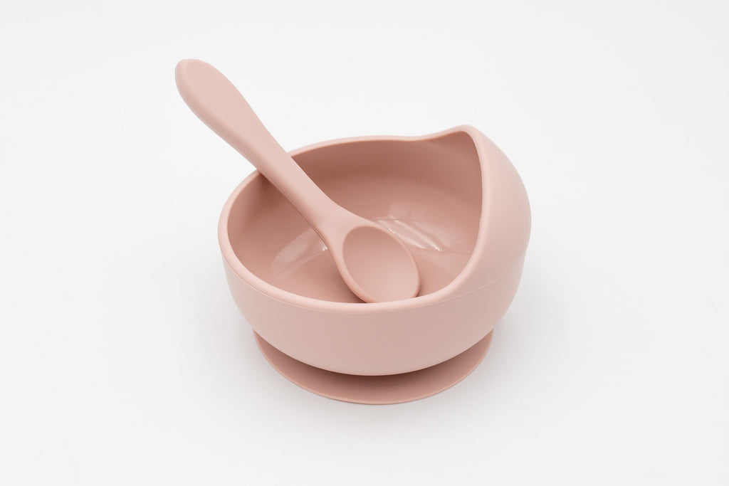 Light pink bowl with suction base and silicone spoon