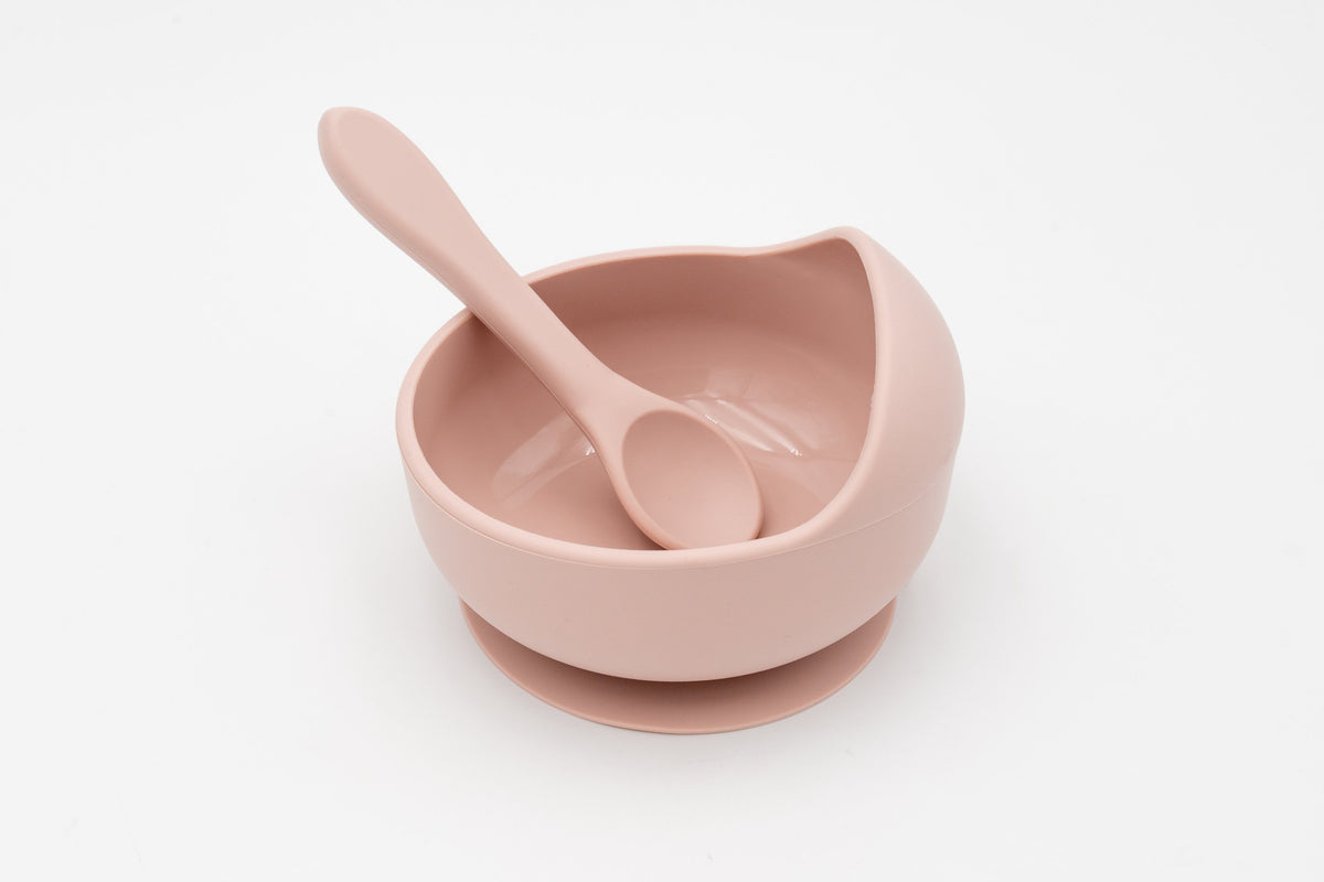 Light pink bowl with suction base and silicone spoon