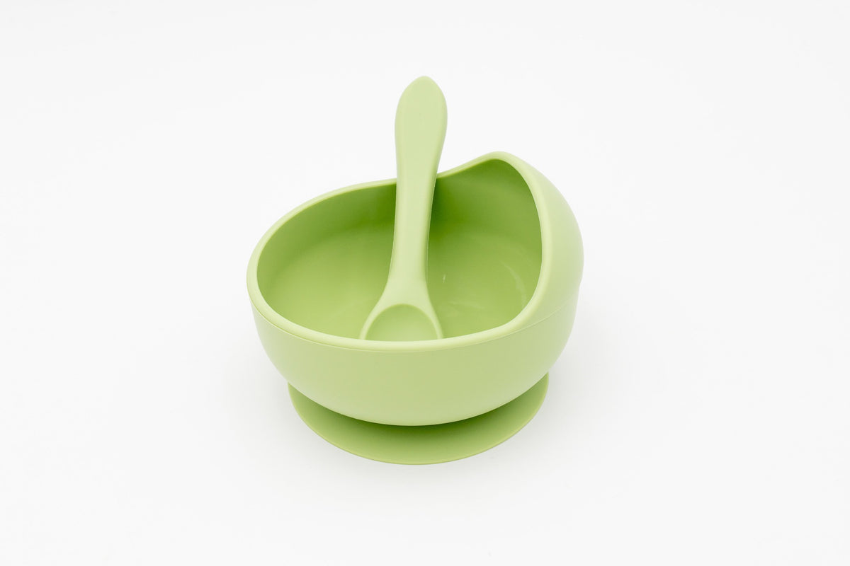 Green silicone bowl with suction base and matching spoon
