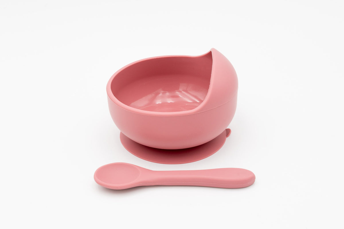 Dark pink bowl with suction base and matching spoon