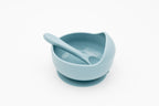 Blue silicone bowl with suction base and matching spoon