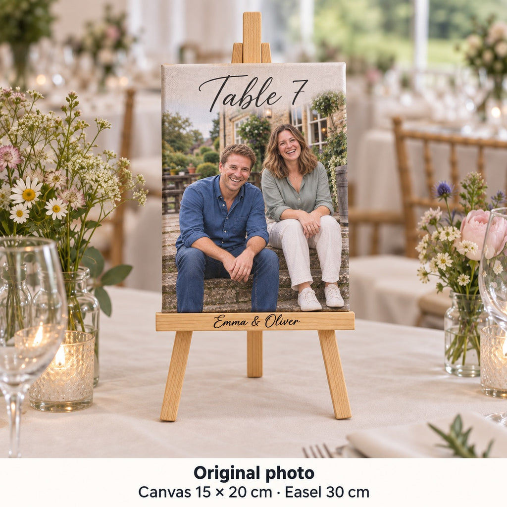 15 × 20 cm canvas with Emma and Oliver’s pre-wedding photo and “Table 7”, displayed on an easel on a wedding reception table.