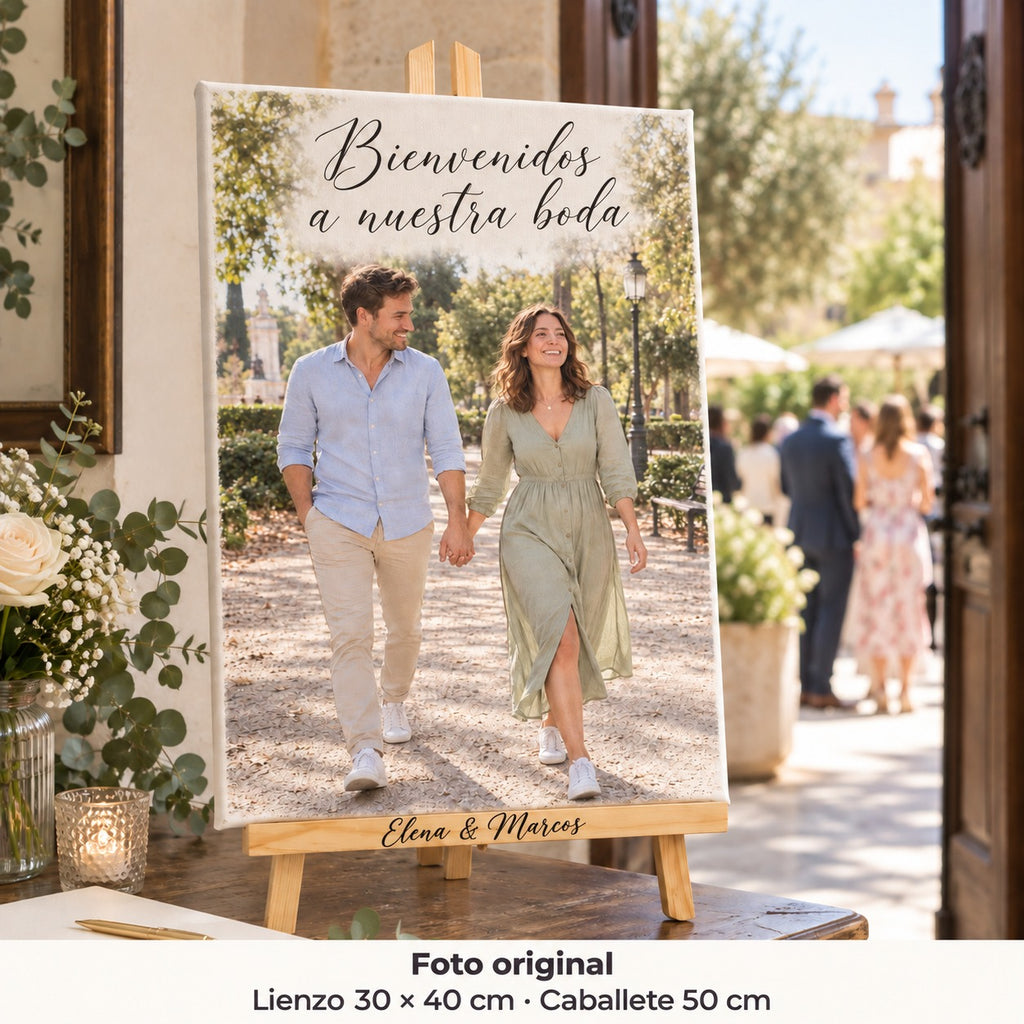 30 × 40 cm wedding welcome canvas with Elena and Marcos’s pre-wedding photo, on a personalised easel at the restaurant entrance.