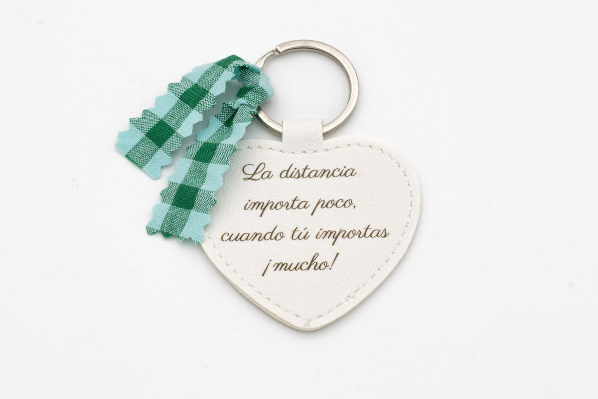 White heart keyring with wording about distance and a green gingham bow.