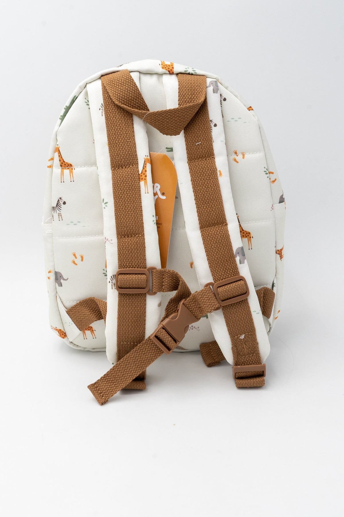 Rear of the white children's backpack with adjustable brown straps, buckle and top handle