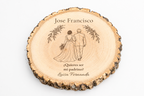 Simulation of a wedding sponsor plaque, laser engraved on ash wood, scene Walking to the altar, Jose Francisco and Luisa Fernanda, figures seen from behind without visible faces.