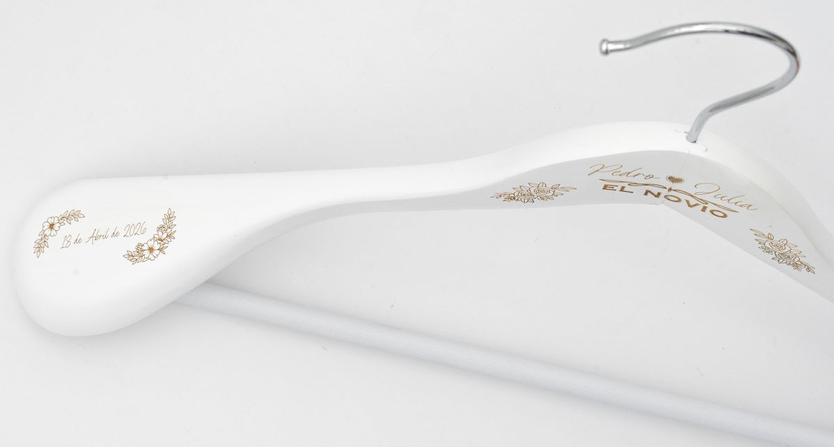 White Hombro Ancho hanger with floral filigree engraved on the shoulders