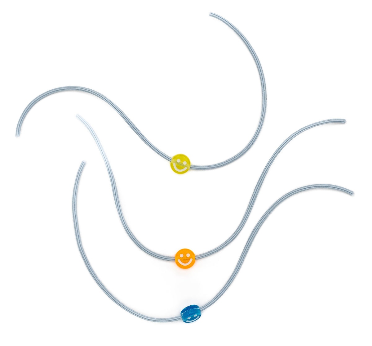 Three elastic grey bracelets with smile beads in yellow, orange and blue