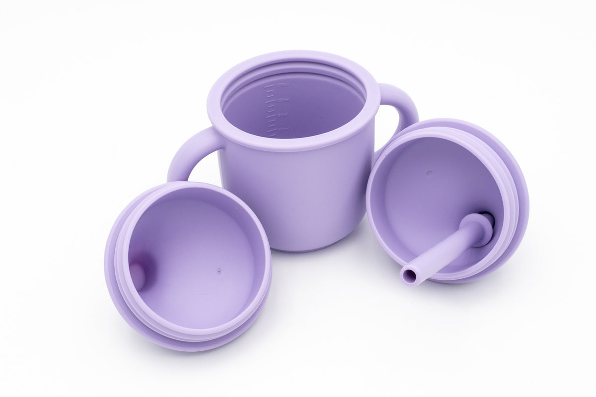Open lilac cup with two handles, two lids and a silicone straw