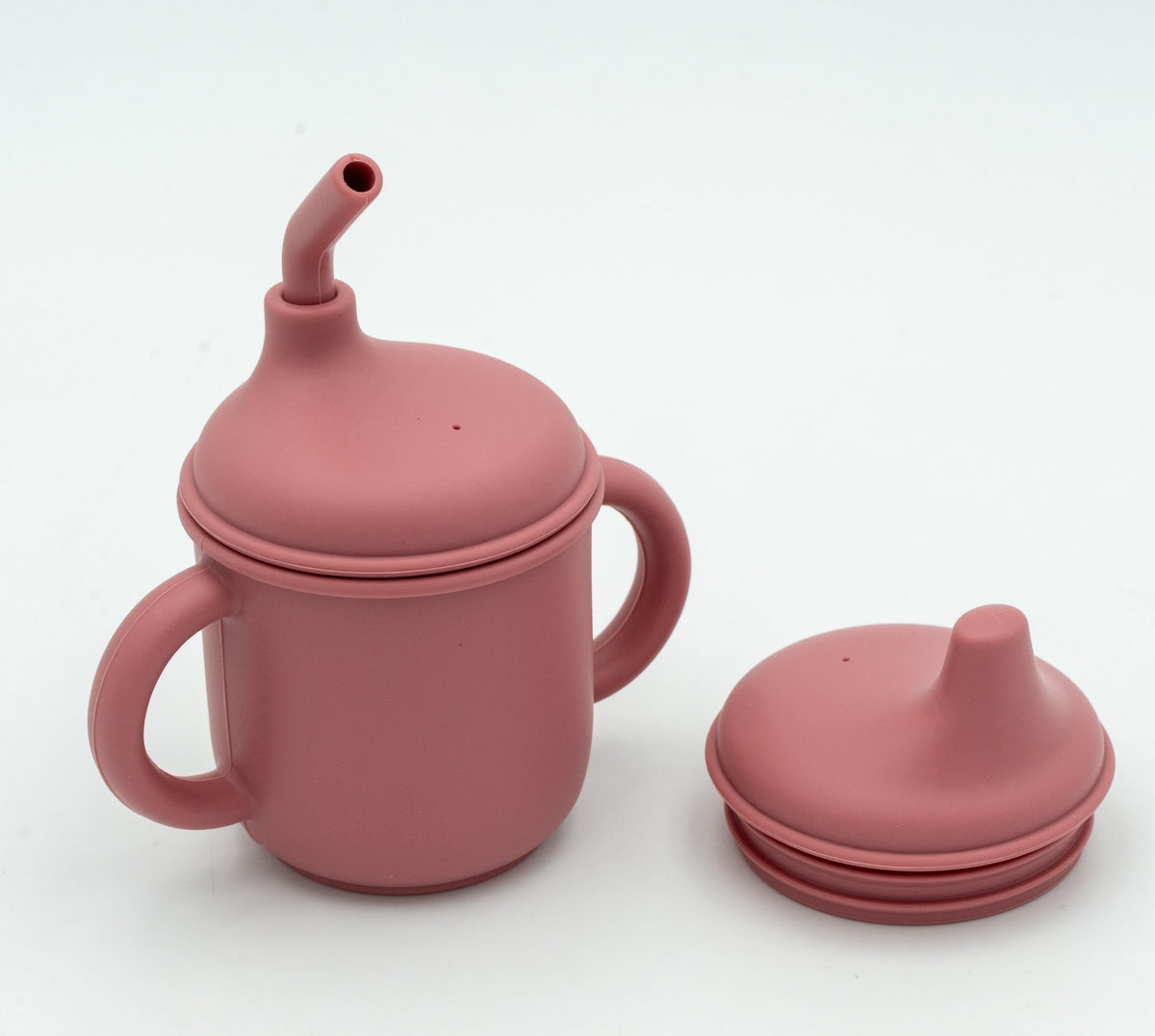 Vaso rosa oscuro con dos asas, pajita y tapa intercambiable